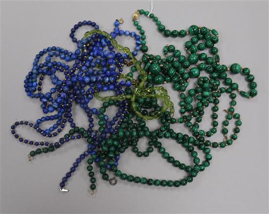 Four malachite bead necklaces with 9ct gold clasps and six other necklaces including lapis lazuli.